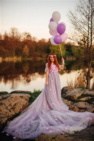 Red Haired Woman With Balloons
