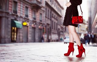 Girl With Bag And Red Boots