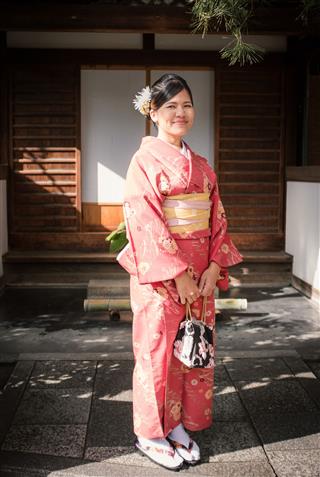 Asian Woman Wearing Red Kimono