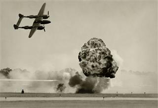 Aerial Bombardment By Twin Engine Plane
