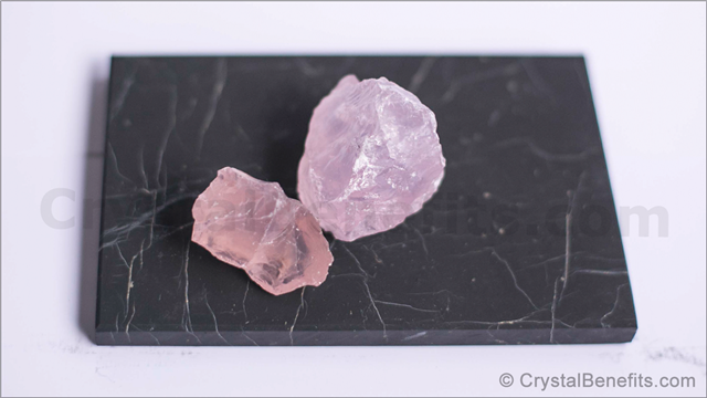 Two rose quartz gemstones